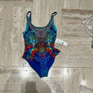 NWT CAMILLA LOWBACK AND ARMHOLE ONE PIECE “HYPED UP HIPPIE”